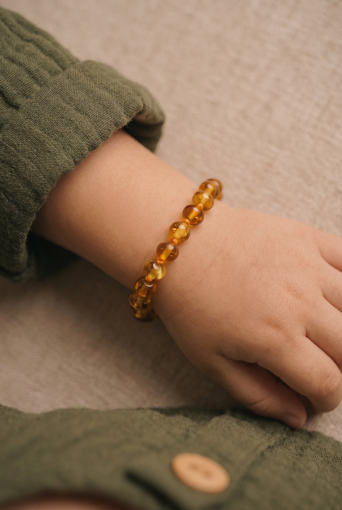 Baby/Kind – Barnsteen armbandje – ronde kraaltjes – 14cm - Honing