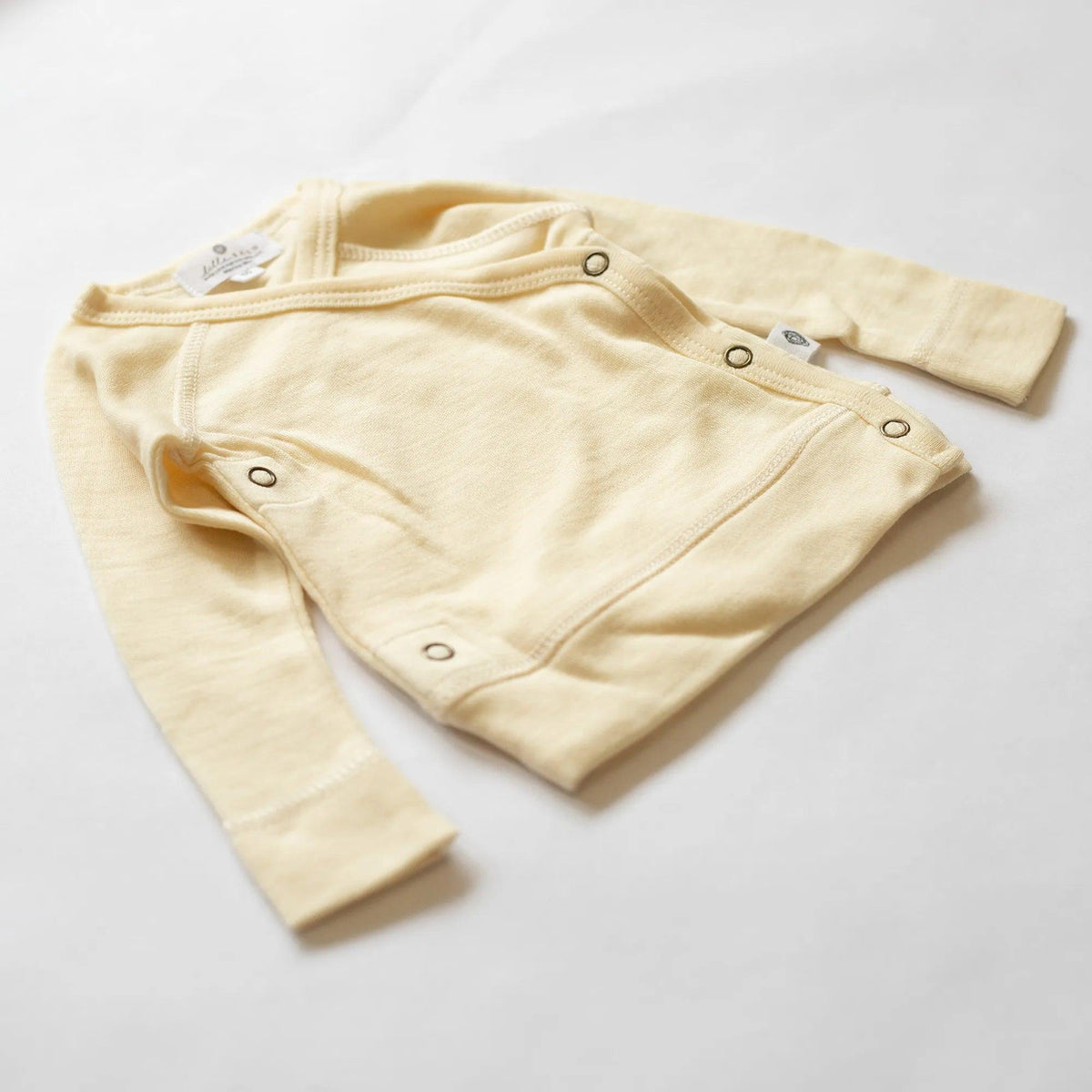 Baby wollen overslag trui – Merinowol - Naturel