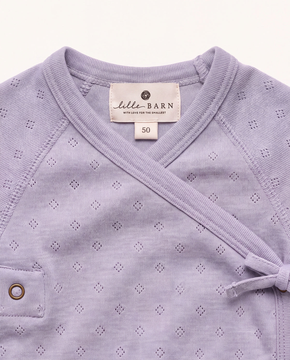 Uld heldragt med fødder i pointelle - merinould - Lavender Frost