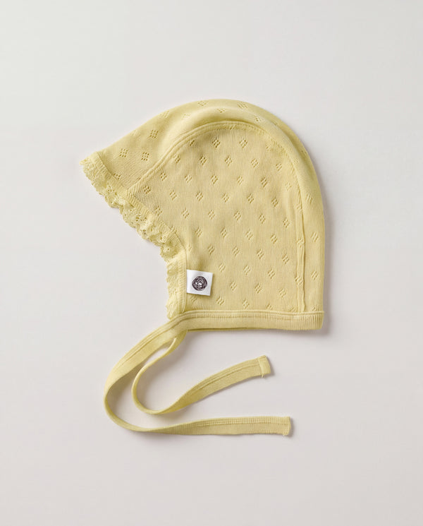 Wool bow bonnet in pointelle - merino wool - Dusty Yellow