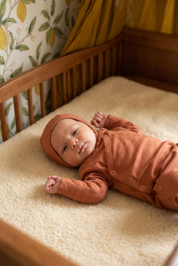 Wollen Baby pakje met voetjes – Merinowol - Coral Gold