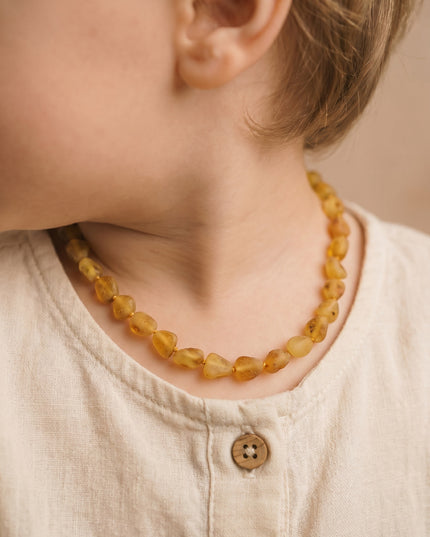 Baby/Kind - Barnsteen ketting - honey - ovalen ruwe steentjes - 33cm