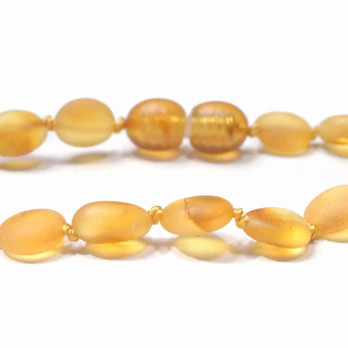 Baby/Kind - Barnsteen armbandje - Ovalen ruwe kraaltjes - Honing - 14cm