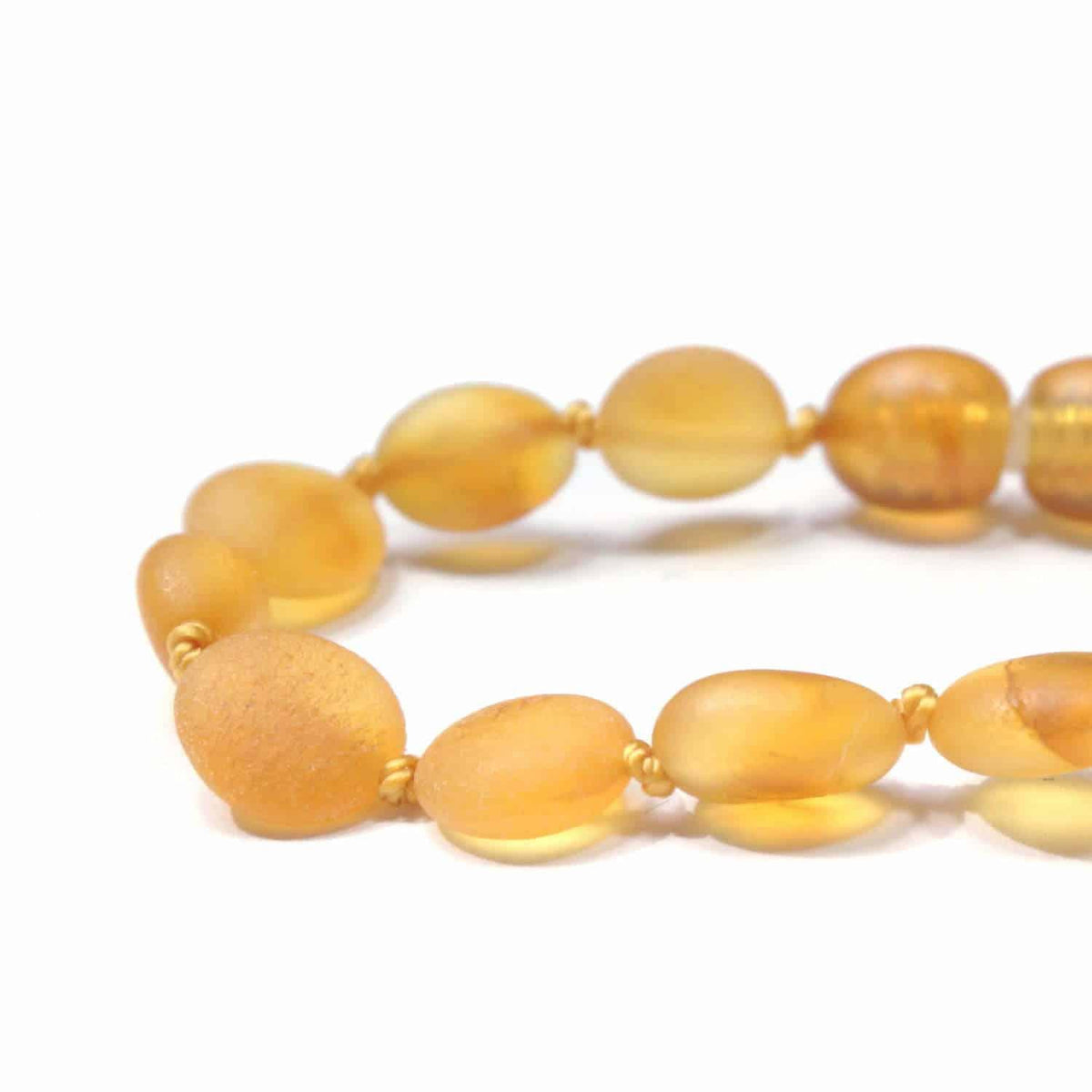 Baby/Kind - Barnsteen armbandje - Ovalen ruwe kraaltjes - Honing - 14cm