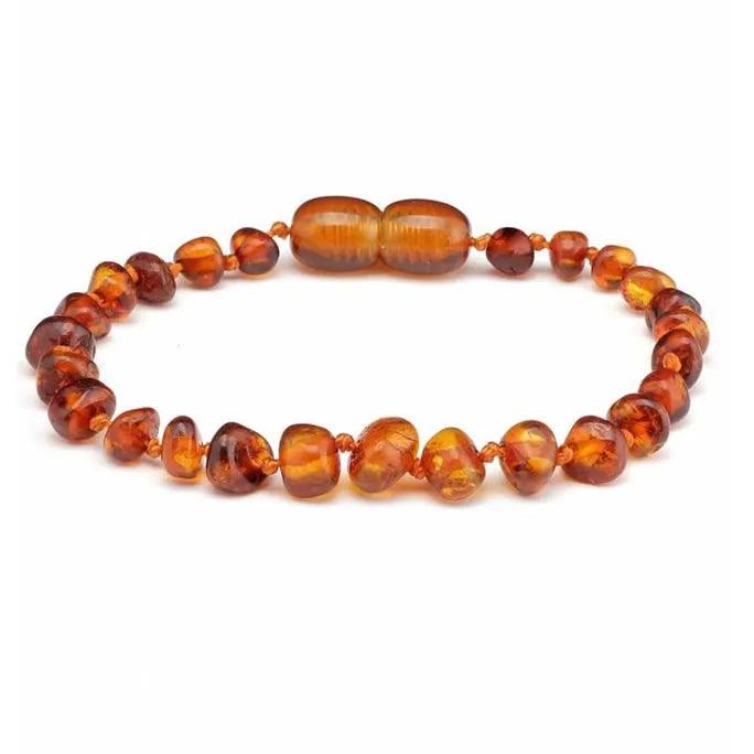 Baby/Kind – Barnsteen armbandje - Ronde kraaltjes - Gepolijst - 14cm - Cognac