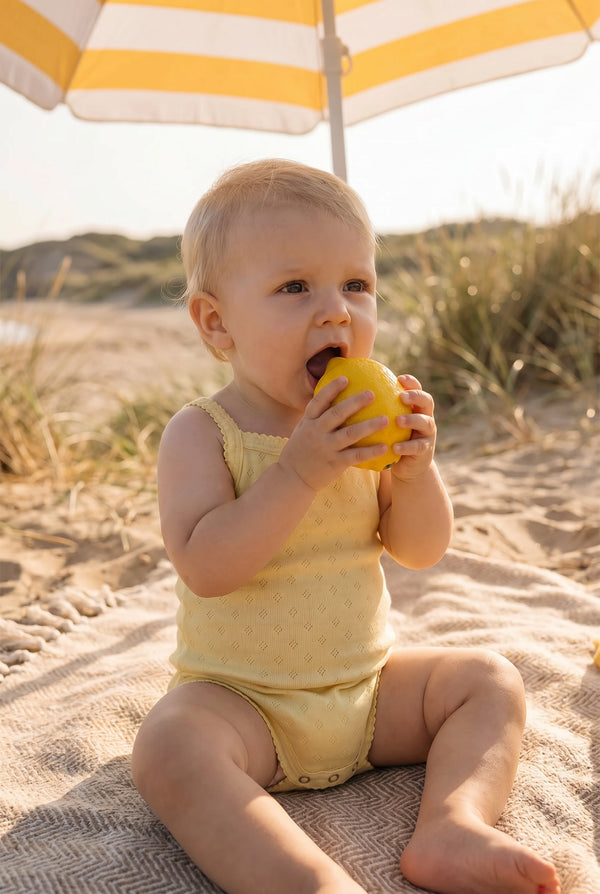 Wollen romper pointelle met bandjes - merinowol - Dusty Yellow