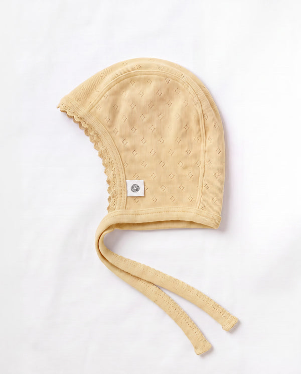 Wollen strikmutsje pointelle - merinowol - Dusty Yellow