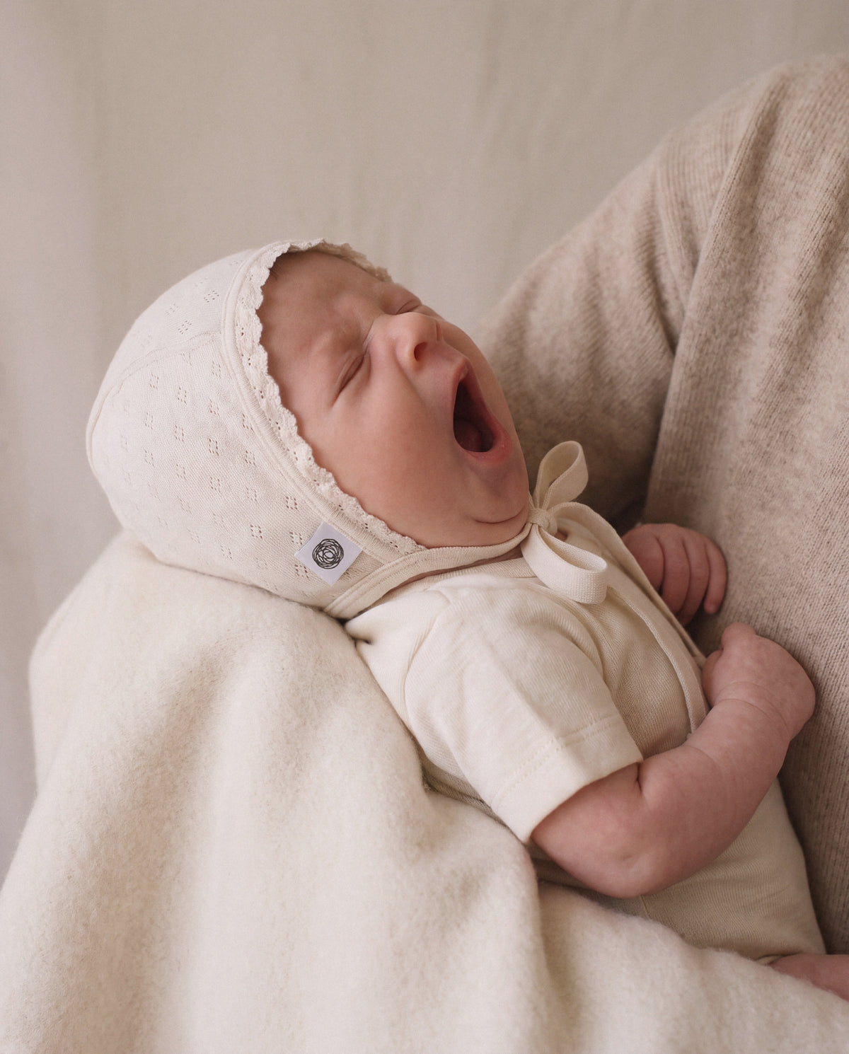 Wool bow bonnet in pointelle - merino wool - Naturel